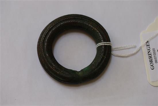 A Tibetan bronze seal, antique copper torq and an Egyptian scarab